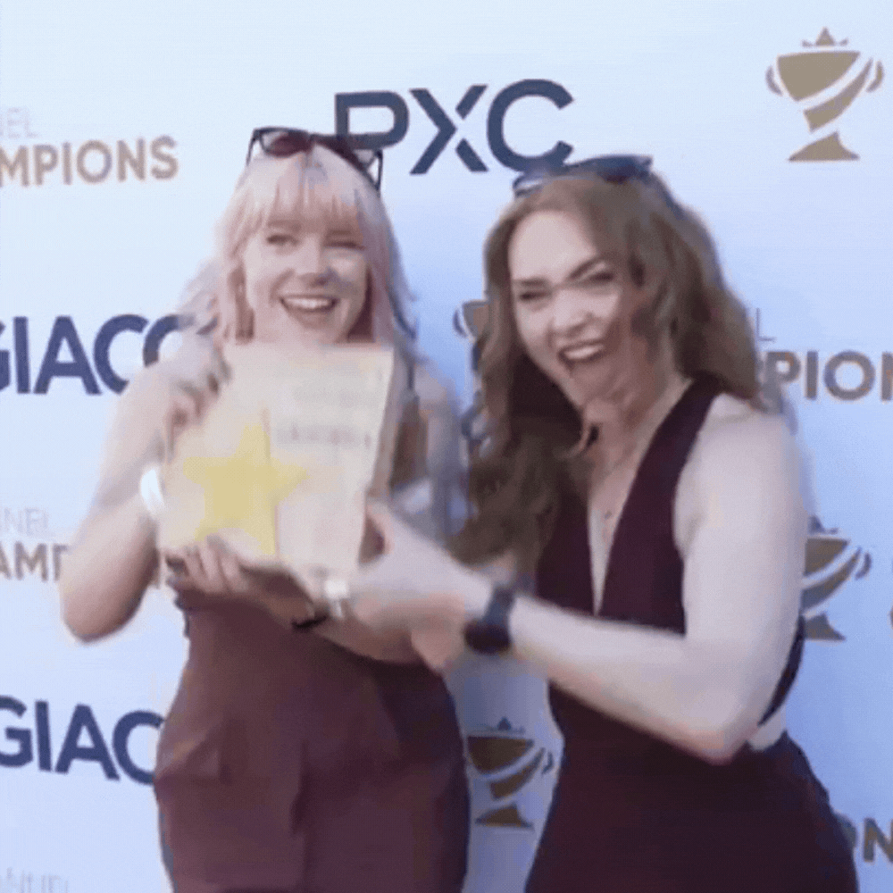 A gif of the Marketing team celebrating with the Event Champions Trophy